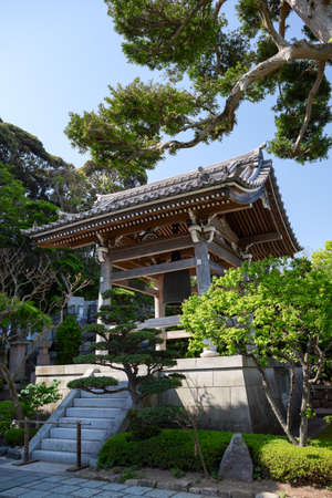KAMAKURA, JAPAN â CIRCA APR, 2013: Wooden bell tower is in inner yard of Hasedera Shrine. Temple is near the village of Hase in the Nara regionのeditorial素材