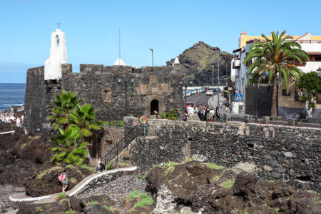 GARACHICO, TENERIFE, SPAIN-CIRCA JAN, 2016: The Castillo de San Miguel fortress is on the coastline of Garachico town. Road TF-42 passes along shore. The Garachico is an ancient town on the northのeditorial素材