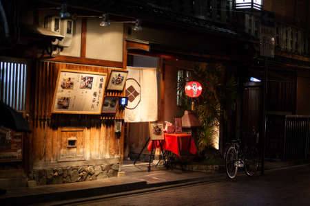 KYOTO, JAPAN - CIRCA APR, 2013: Typical Kaiseki restaurant is in Gion district at night time. Hanamachi is a Japanese geisha district with various okiya (geisha houses) and ochaya (teahouses).のeditorial素材