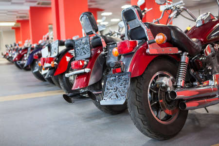 Line of top quality used motorcycles such as classic chopper is on sale. Bike shop or storage for winter laying-up and savingの写真素材