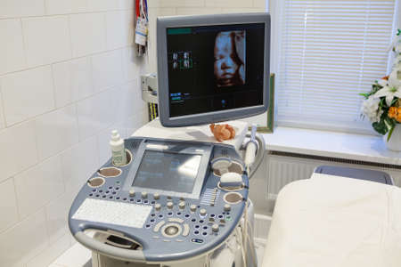 Medical equipments for ultrasonography in clinic. Interior of hospital room with ultrasonic...