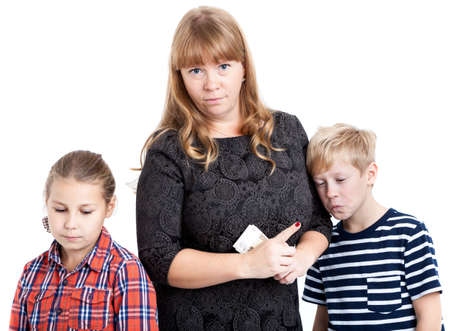 Strict mother read the riot asts her children about pocket money spending, holds cash in hands and gesturing with finger, isolated on a white backgroundの写真素材