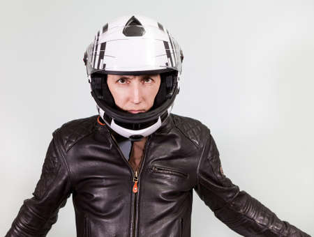 Biker portrait on a greyの写真素材