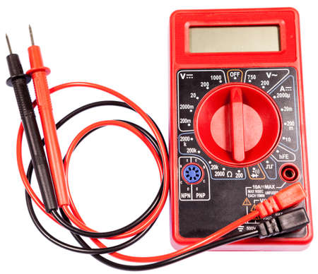 Red multimeter device with lcd screen for measuring electricity, isolated on a white backgroundの写真素材