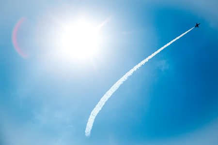 Jet in blue skyの写真素材