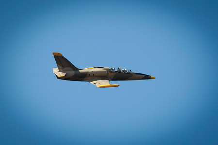 Jet in blue sky
