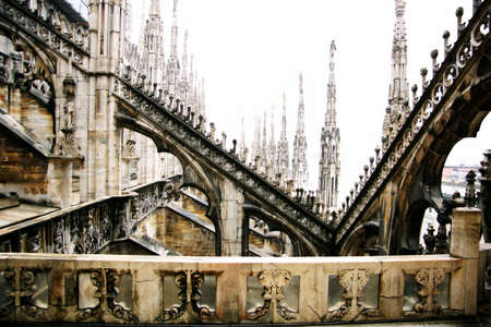 Fragment of a roof and balcony of Duomo in Milanの写真素材