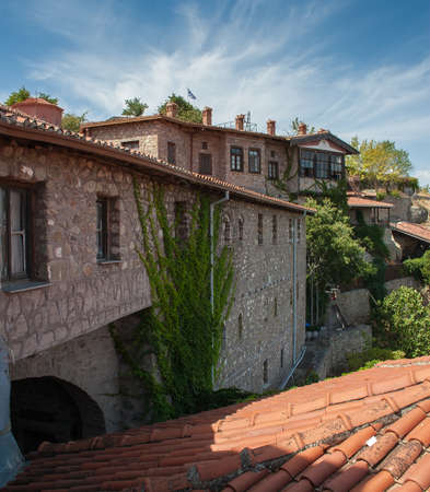 The view from the window of a monastery on the roof and the building complex of the Holy place the...