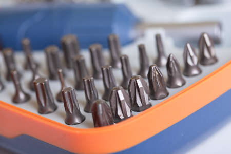 Set heads under the nut. Metal bits for Phillips and flat screwdriver. Tool set for household use....
