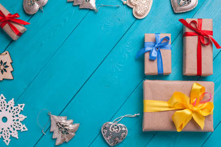 Turquoise background for Christmas cards. Background for Christmas wishes. Blue wooden planks. Vintage background for congratulation. Christmas card. Christmas gifts. Holiday gift. Christmas deer.の写真素材