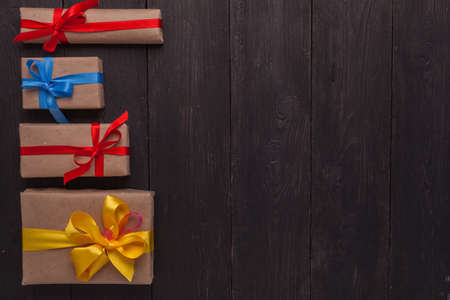Top view of the gifts located at the left of the frame. The text of your ad to the right. Background...