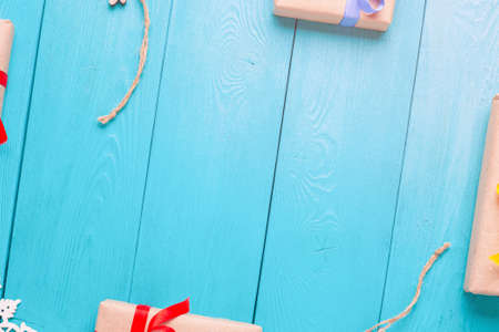 Blue wooden planks. Vintage background for congratulation. Christmas gifts. Holiday gift. Rotated view with flashの写真素材