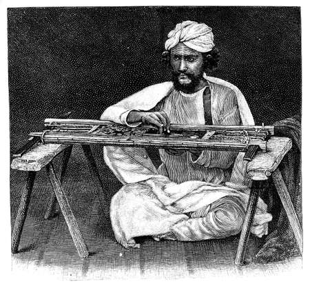 Victorian engraving of a scarf maker, India. Digitally restored image from a mid-19th century Encyclopaedia.の写真素材