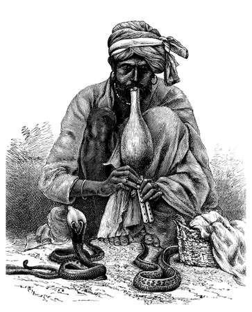 Victorian engraving of a snake charmer, India. Digitally restored image from a mid-19th century Encyclopaedia.の写真素材