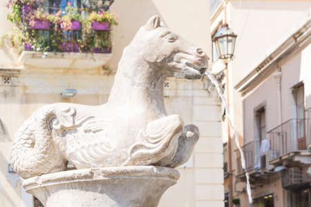 Hippocampus fountain in Taormina in horizontal formatの写真素材