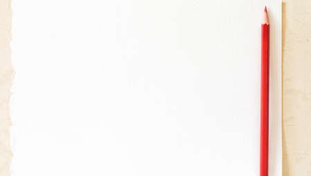 Background with white sheet of paper and red pencil, horizontal format