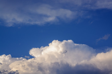 Background with cumulus clouds on blue sky
