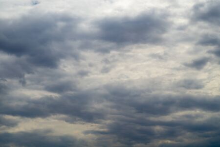 The sky is gloomy, the sky in bad weather over the cityの写真素材