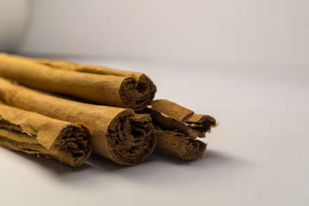 Real cinnamon on a white backgroundの写真素材