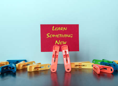 Multiple clamps hold lettering paperの写真素材