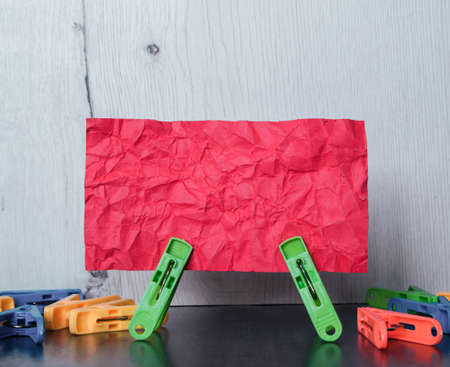 Multiple clamps hold lettering paperの写真素材