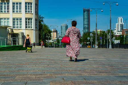 A woman walking down the street