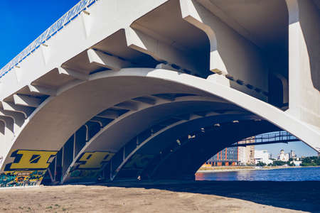 View on the historical Bridge with in the back the pedestrian bridge connection downtownの写真素材