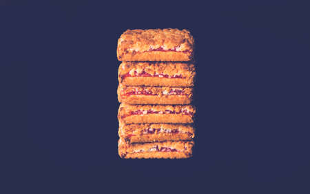 Cookies in a stack isolated on blackの写真素材