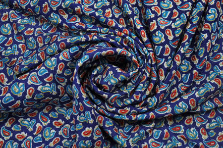 Blue cloth with red and blue patches
