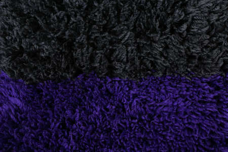 Black purple shaggy carpet closeup