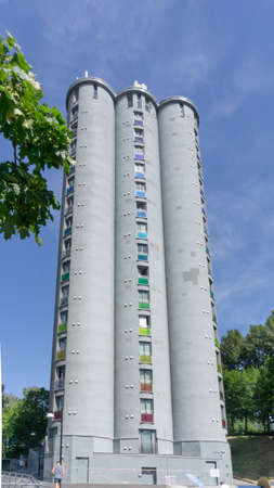 Oslo, Norway - July 2018: a high-rise building of a student hostel in the form of three connected pipes. Bottom view.のeditorial素材