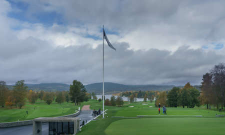 .A green golf course on the shores of Lake Bogstad.の写真素材