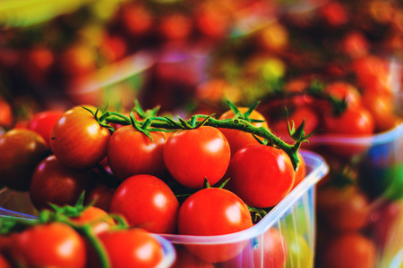 fresh, red small sherry tomatoes in Jaffa market in Israelの写真素材