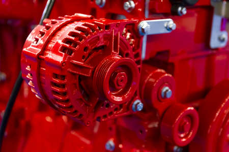 Detail of red powerful engine, diesel motor for oversize trucks, SUV, cargo, commercial and construction vehicles, heavy industry, selective focusの写真素材