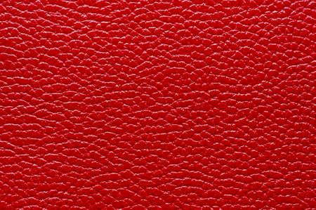Red leather for manufacturing of shoes, clothes, bags and other fashion accessories, high quality natural seamless material sample, textured background, top viewの写真素材