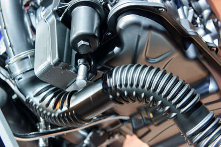 Car engine, concept of modern vehicle motor with metal, chrome, plastic parts, heavy industry