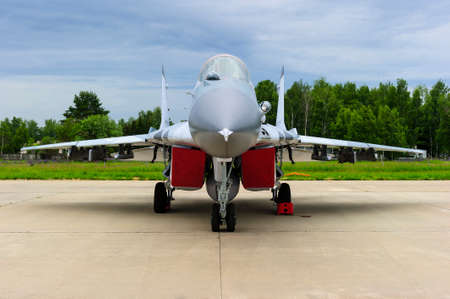 Fighter-bomber jet, military multifunction plane on airfield runway, modern army, aviation and...