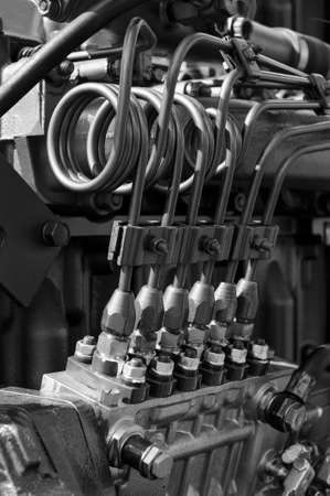 Detail of engine for construction machines such as bulldozer, tractor, excavator, loader, truck and other, heavy industry, monochrome shotの写真素材