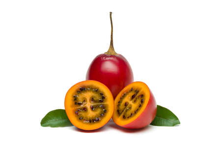 Tamarillo with slices and green leaves isolated on white background, exotic tropical Thai fruit, tree tomato, healthy food, diet nutritionの写真素材