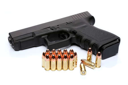 Gun with magazine and ammoの写真素材