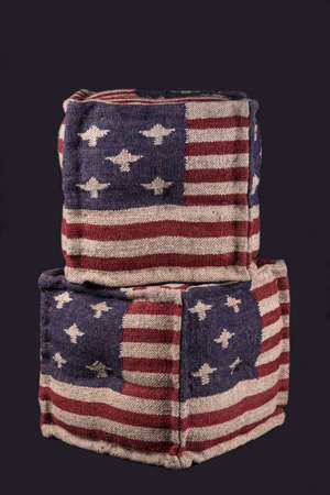 Two Ottomans with American flag on gray backgroundの写真素材