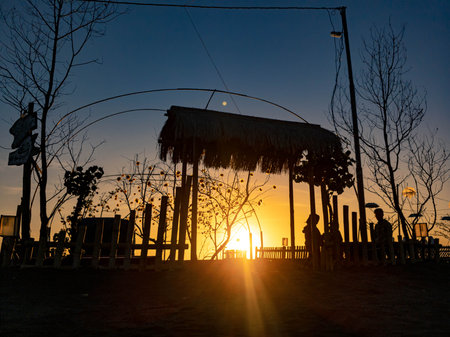 Silhouette of a pavilion at sunset in the evening.