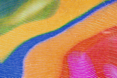 abstract background, multi-coloured stripes on the fabric, close-upの写真素材