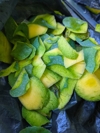 peeled ripe mango skinの写真素材