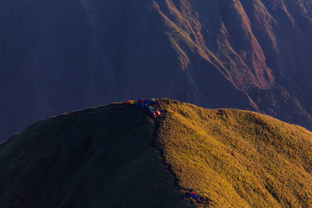 Colorful tents on the top of Mount Anak Dara, Lombok, Indonesiaの写真素材