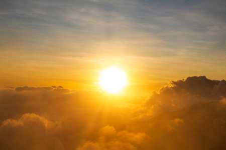 Sunrise over the mountain with expanse of clouds on Mount Anak Dara, Lombok, Indonesia
