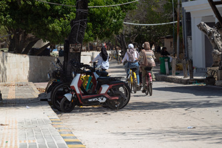 bicycles parked on a path on gili trawangan island, lombok indonesiaの写真素材