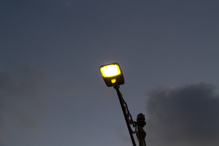 Modern LED Street Light Illuminating Twilight Skyの写真素材