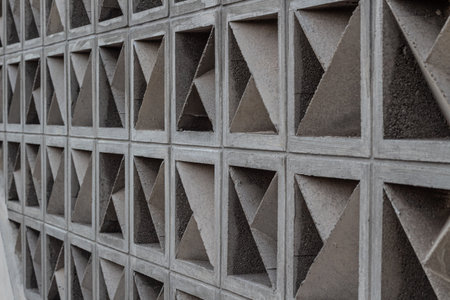 Textured Concrete Facade - Repetitive Geometric Pattern