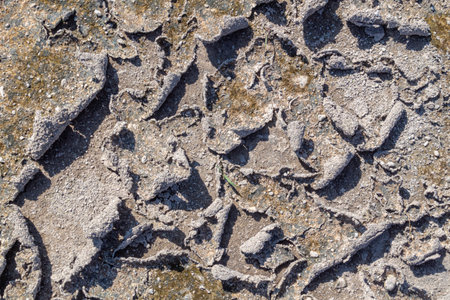 Close up top view of abstract dry cracked mud texture on ground surface pattern backgroundの写真素材